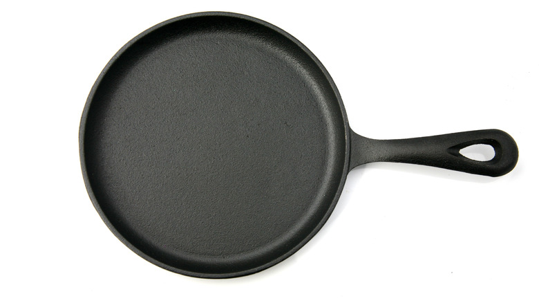 cast iron frying pan on a white background