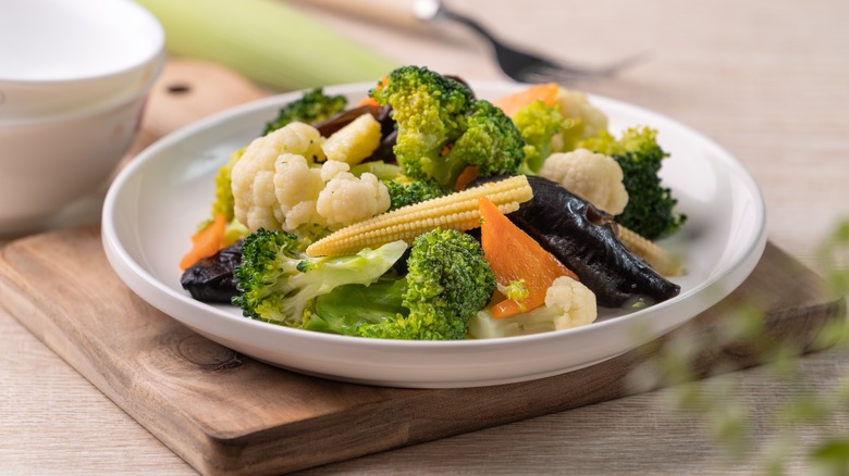 White bowl of assorted veggies