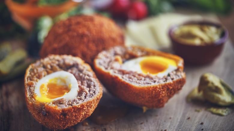 Scotch eggs cut open