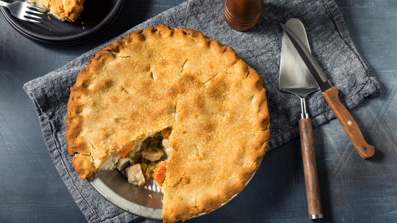 Chicken pot pie with utensils