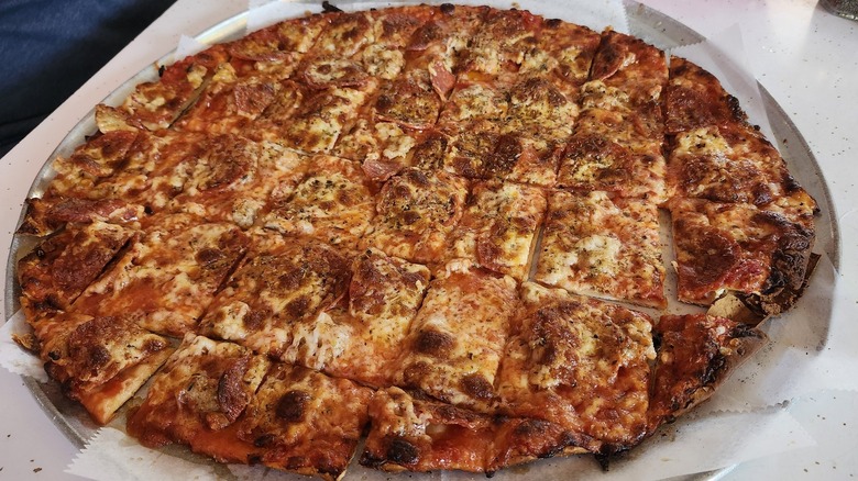 Pizza with eggs on top