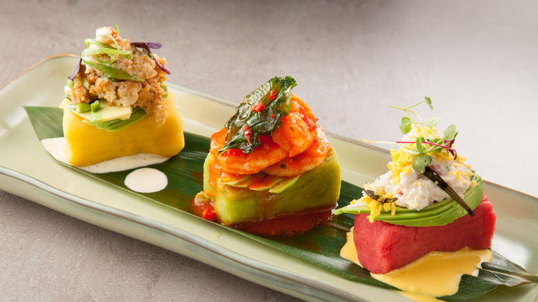 Peruvian causa with three garnishes