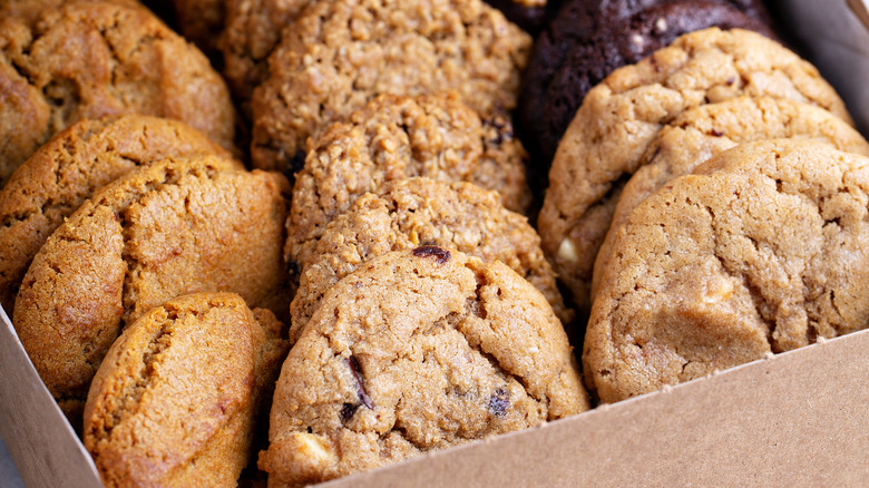 Box of assorted cookies including peanut butter, chocolate chip, oatmeal, and doubel chocolate