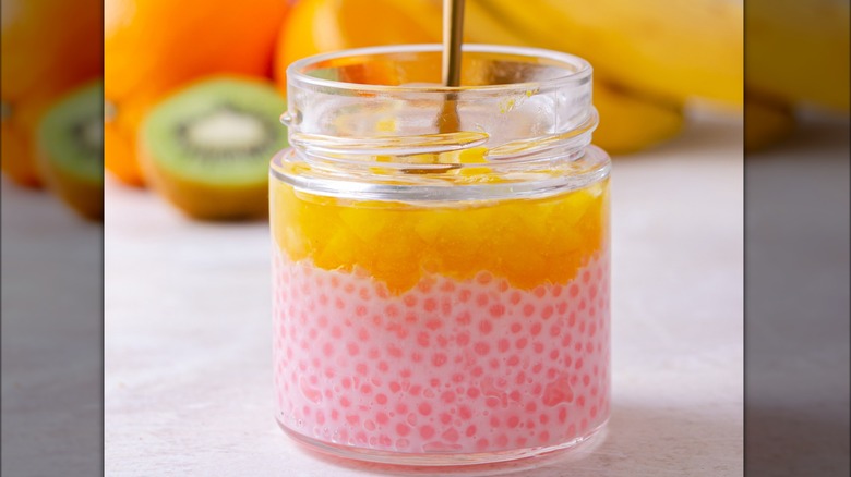 popping boba on top of chia seed pudding