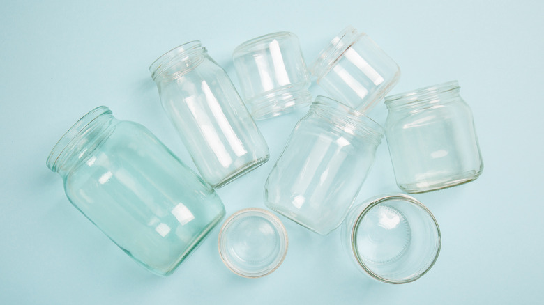 Empty glass jars on counter