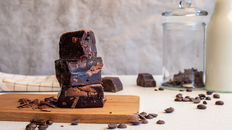 fudgy brownies on wooden plate