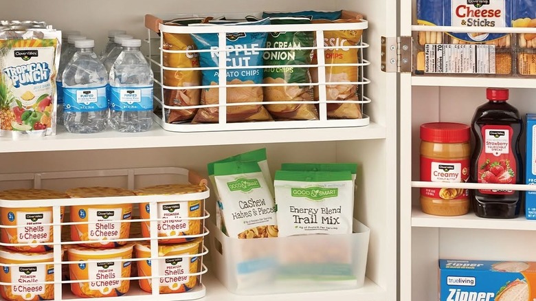 Generic pantry and household staples organized neatly in a pantry.
