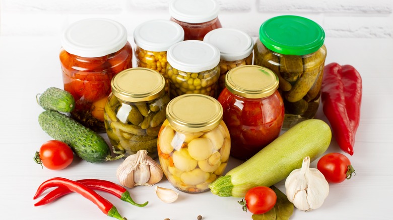 different types of pickles in jars