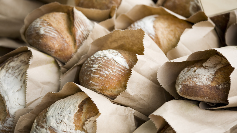 fresh baked bread in paper bags