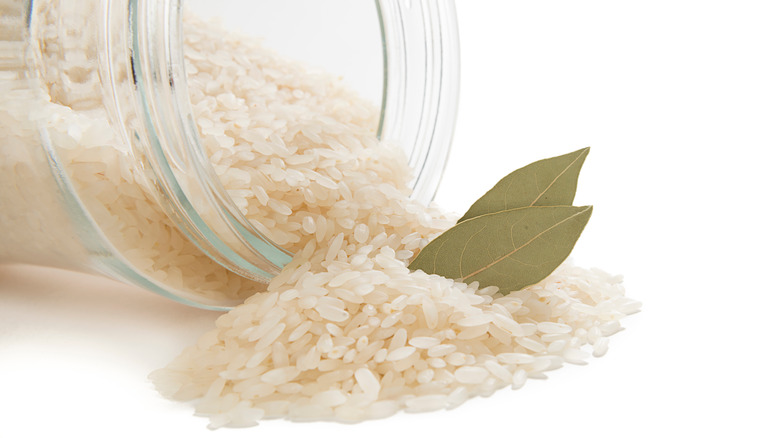 Jar of rice with bay leaves