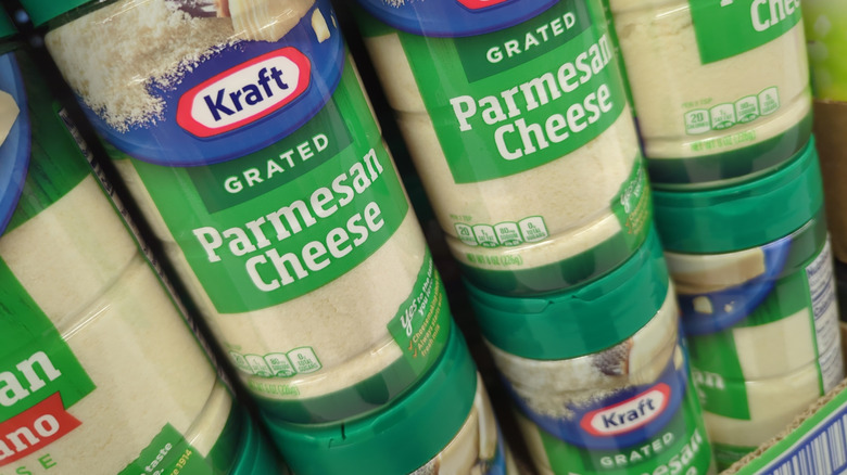 Close-up vies of several Kraft Parmesan cheese bottles