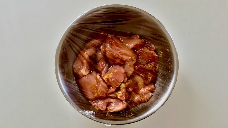 raw chicken in marinade