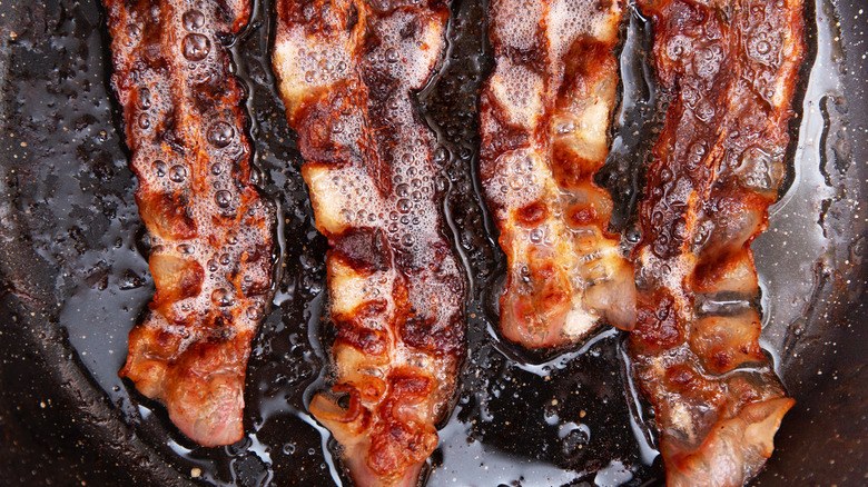 Bacon cooking in a pan