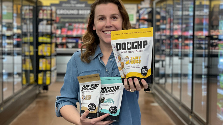 Kelsey Moreira with bags of Doughp Drops at Walmart
