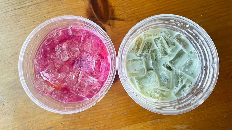Overhead view of Wicked Pink and Wicked Green Matcha Refreshers from Dunkin'