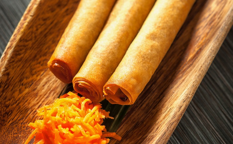 These thin, crispy Filipino spring rolls pack in ground pork and several vegetables.