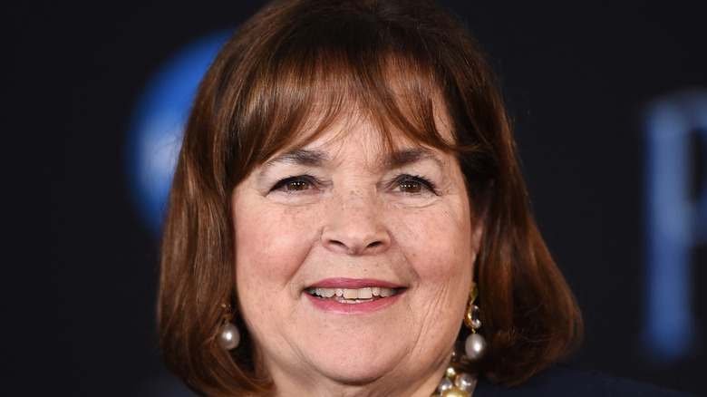 Ina Garten smiles at an event.