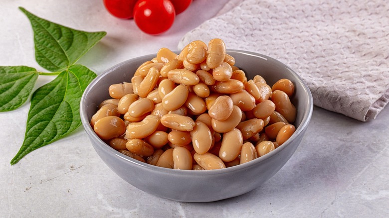 Canned cannellini beans in a small bowl