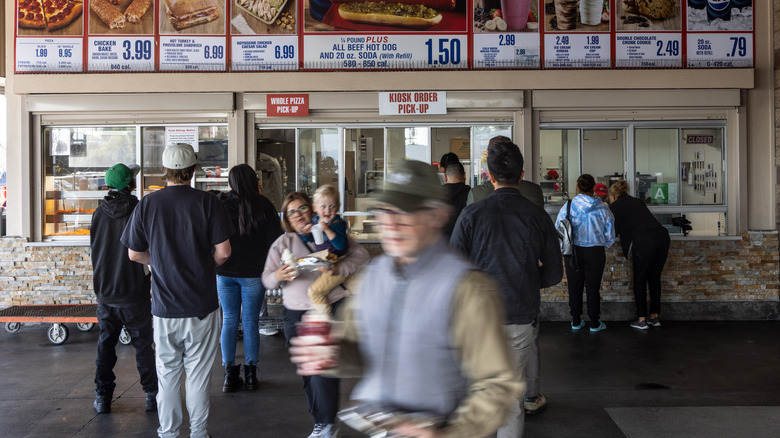 People queuing at Costco food court.