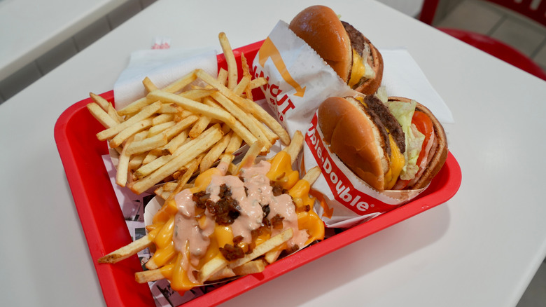 Two double double burgers with animal-style fries from In-N-Out.