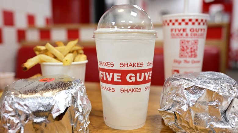Five Guys burgers, fries, and milkshake.