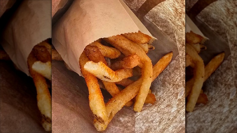 Five Guys Cajun fries in a bag.