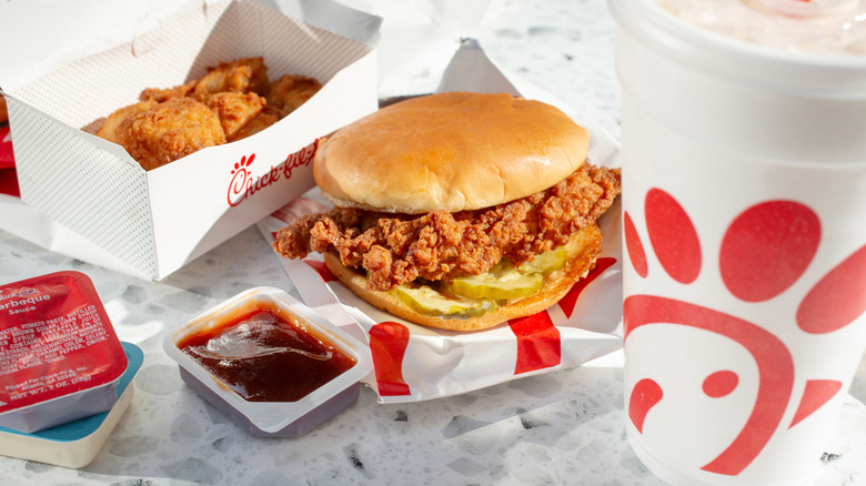 Chick-Fil-A sandwich pictured alongside sauce.
