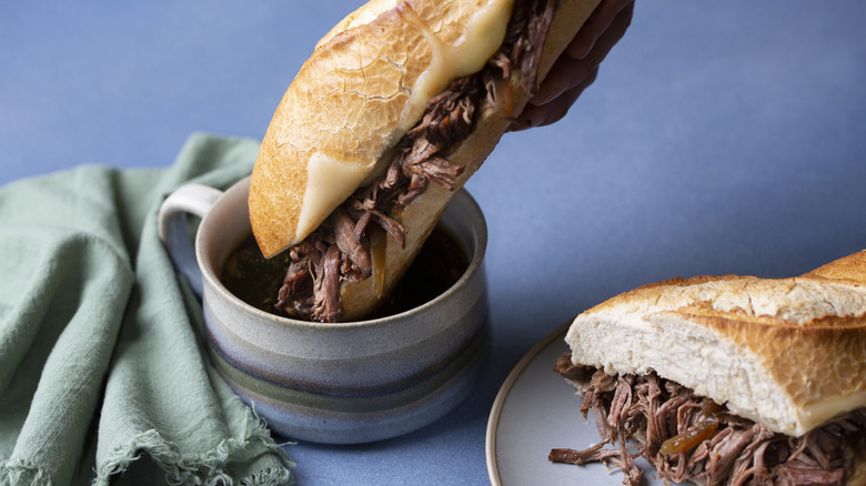 French dip sandwich dipped in au jus.