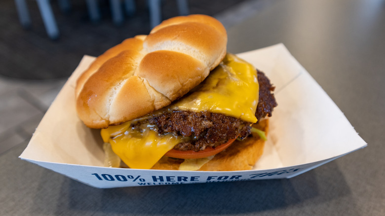 A Culver's ButterBurger Cheese in a paper serving tray