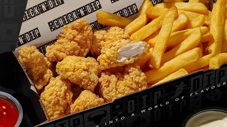 A plate of boneless bites and fries from Domino's.