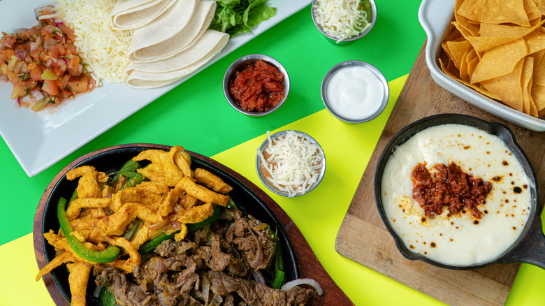 Fajitas, queso, chips, and all the trimmings