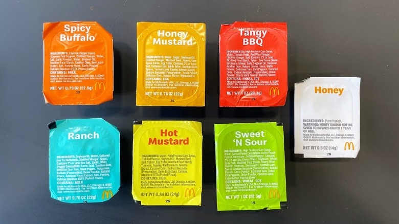 McDonald's sauce cups in different flavors.