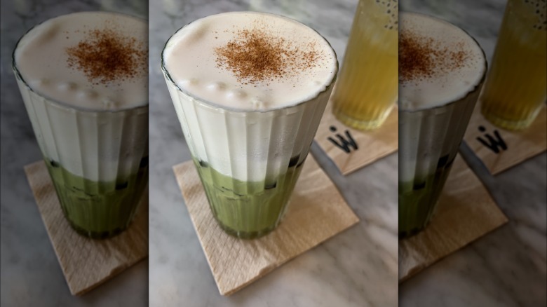 Matcha latte with cinnamon on top