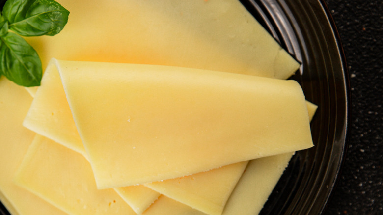 Sliced cheese on a plate