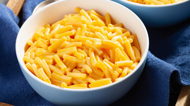 Bowls of cooked boxed mac and cheese