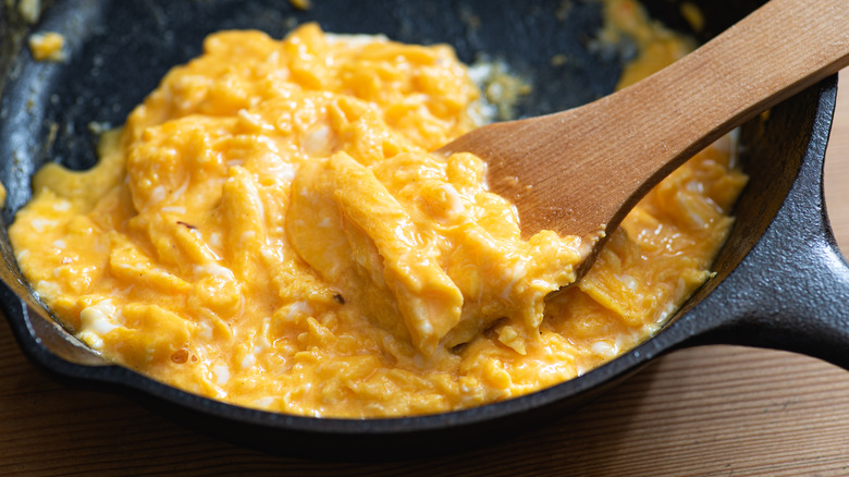 cooking scrambled eggs