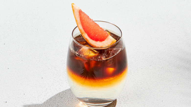 Espresso tonic with citrus garnish 