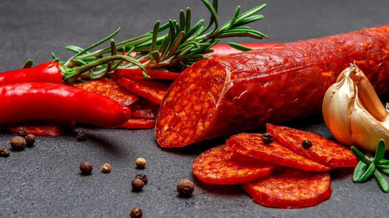 sliced red pepperoni sausage on display