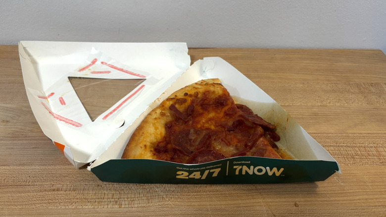 A slice of 7-Eleven pepperoni pizza