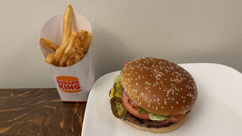 Texas Double Whopper on plate next to Burger King fries