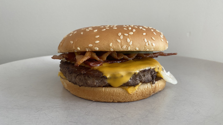 McDonald's Bacon Quarter Pounder with Cheese sitting on a plate