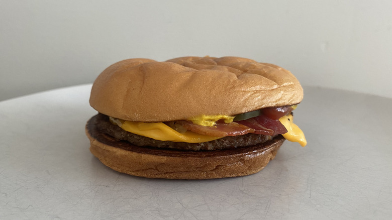 McDonald's Bacon McDouble sitting on a plate