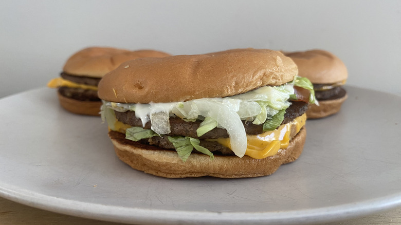 three McDonald's cheeseburgers