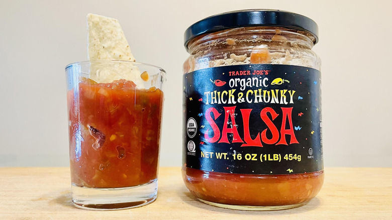 Jar and dish of Trader Joe's Organic Thick & Chunky Salsa