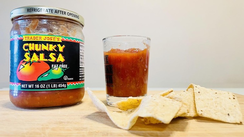 Jar and dish of Trader Joe's Fat Free Chunky Salsa with tortilla chips