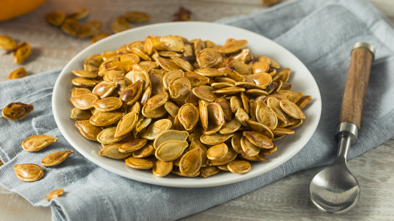 plate of roasted pumpkin seeds