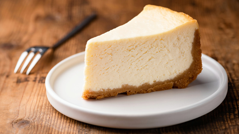 slice of cheesecake with fork