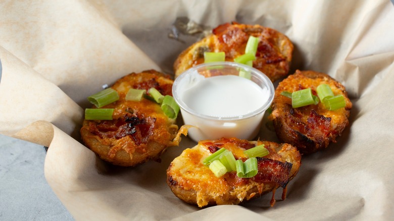 loaded potato skins with sauce