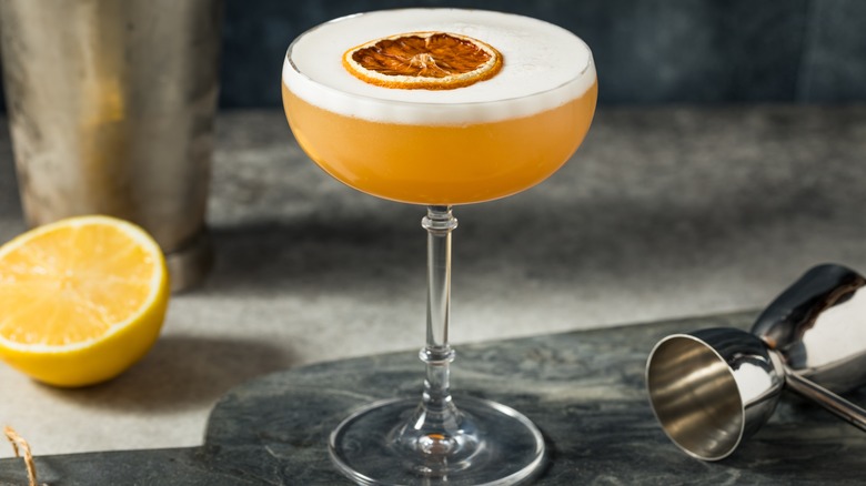 Whiskey sour cocktail in coupe glass