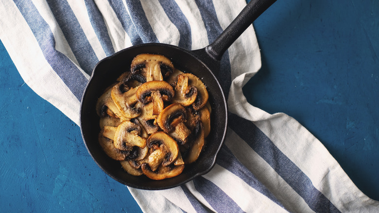Cooked mushrooms in a skillet